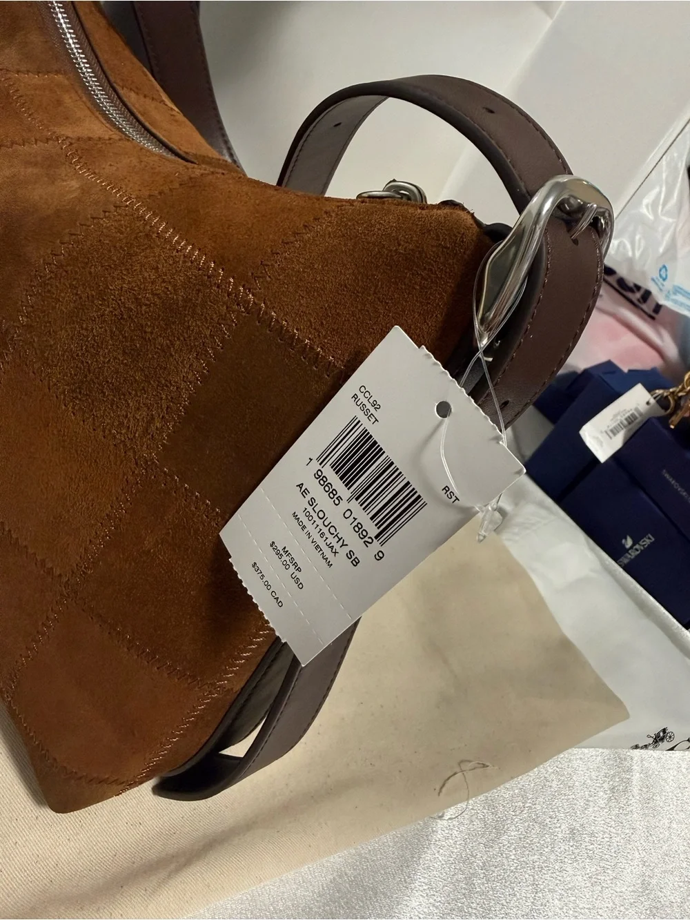 Coach main suede